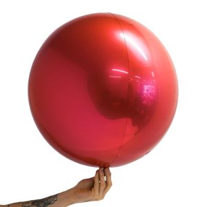 Loon Balls Metallic Red 61cm Balloons #288027 - Each (Pkgd) Perfectly round foil sphere - 24" size - Helium Or Air Inflate. Can also be filled with 60% helium and 40% air. Recommended to start inflation with a hand pump then move to a latex or bubble regulator and finish inflation with the hand pump until all creases fully disappear. Please be aware when inflating: Do NOT put nozzle too far into the balloon, if inserted too far or inflated too fast or with too much pressure the valve will damage and leak.