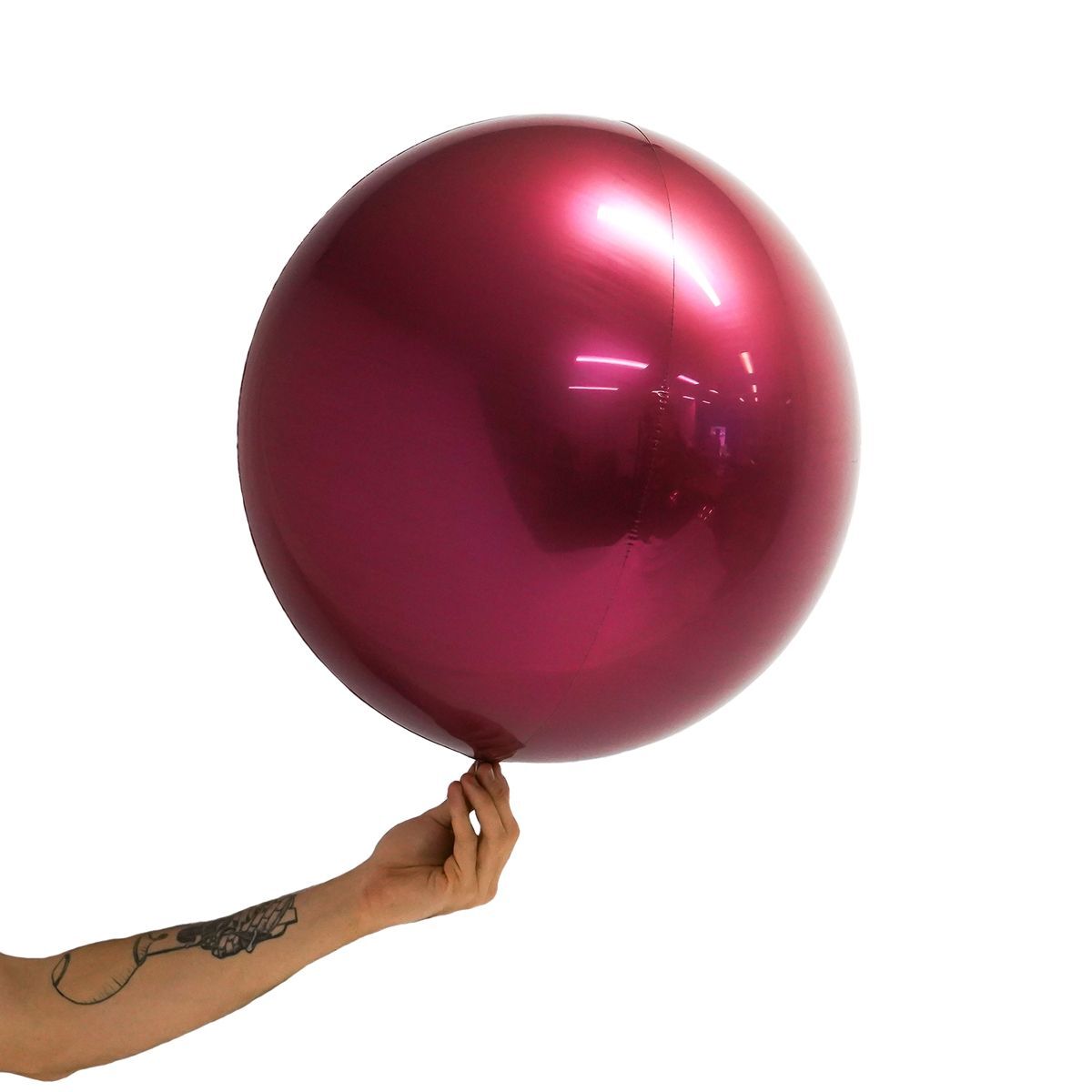 Loon Balls Metallic Burgundy 51cm Balloons #288226 - Each (Pkgd) Perfectly round foil sphere - 10" size - Helium Or Air Inflate. Can also be filled with 60% helium and 40% air. Recommended to start inflation with a hand pump then move to a latex or bubble regulator and finish inflation with the hand pump until all creases fully disappear. Please be aware when inflating: Do NOT put nozzle too far into the balloon, if inserted too far or inflated too fast or with too much pressure the valve will damage and leak.