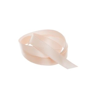Ribbon Satin Nude Deluxe Double Faced 10mm x 25m #KC211025NU - Each This 10mm wide double face satin ribbon in Nude has a smooth, silky and shiny surface on both sides, and it is made from a high-quality polyester material giving it a luxurious appearance. The ribbon is durable and can withstand wear and tear without fraying easily. Perfect for gift wrapping and packaging to add a touch of elegance and sophistication to presents and gift boxes, it can be used in fashion design to embellish garments, as a trim on dresses or hats, or as a decorative element on shoes or handbags as well being used in floral arrangements, wedding decorations, and other event decor to add a pop of color and texture to the design.